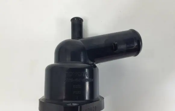 Thermostat/thermostat housing
