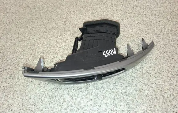 SsangYong Korando Dash center air vent grill 6962M34400