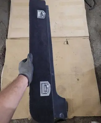 Trunk/boot lower side trim panel