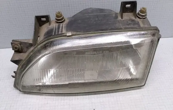 Ford Escort Headlight/headlamp 91AG13006C2B 0245486