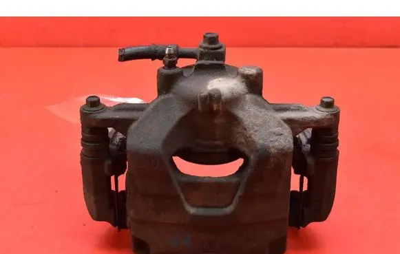 Opel Astra J Front brake caliper