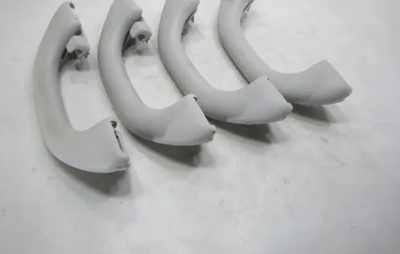 Volkswagen PASSAT B7 A set of handles for the ceiling 1K0857607