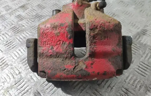 Volkswagen Golf V Front brake caliper 581