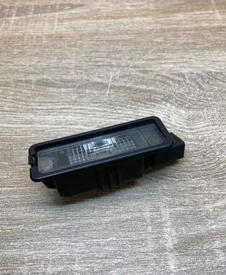Volkswagen Golf VII Number plate light 1K8943021