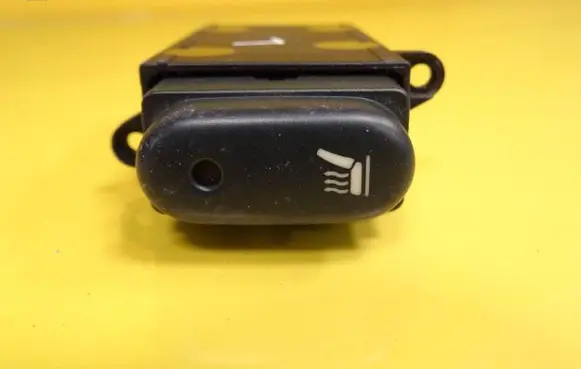 Seat heating switch