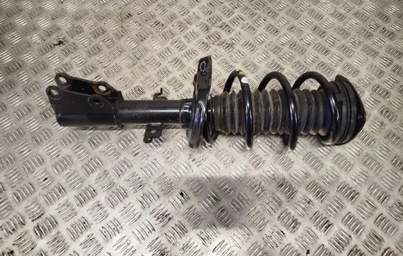 Front shock absorber with coil spring