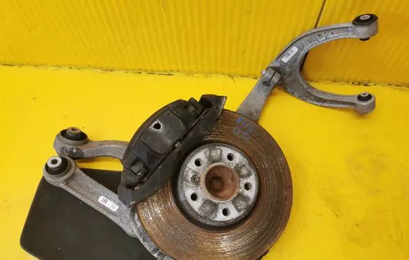Front wheel hub spindle knuckle