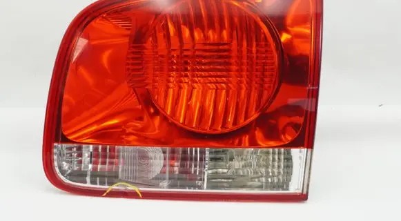Volkswagen Touareg I Tail light bulb cover holder 7L6945260A 28268003