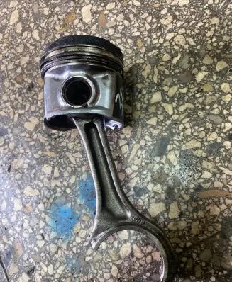 Piston with connecting rod