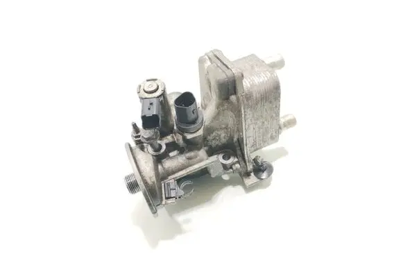 Volkswagen Polo VI Engine oil radiator 9815831580