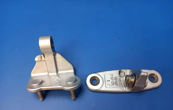 Rear door upper hinge