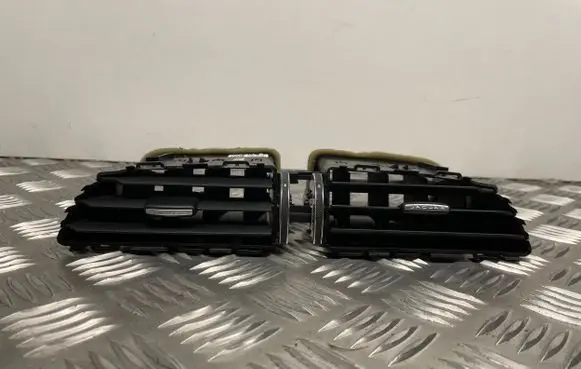 Jaguar XE Dash center air vent grill GX73014L21BC