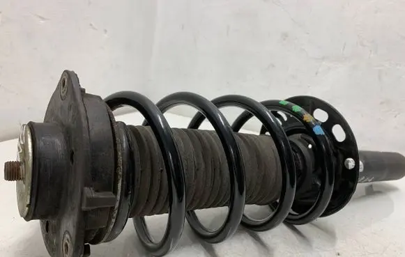 Volkswagen Golf VI Front shock absorber with coil spring 1K0413031DF
