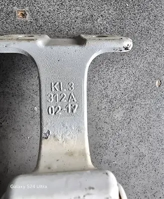 Rear door upper hinge