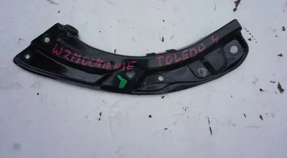 Seat Toledo IV (NH) Headlight/headlamp mounting bracket PASPRZEDNI