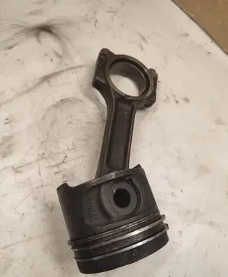 Piston with connecting rod