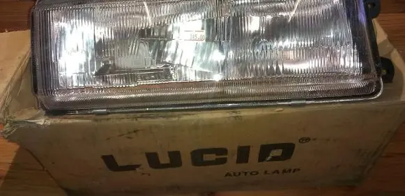 Mitsubishi Lancer Headlight/headlamp 2141112ld