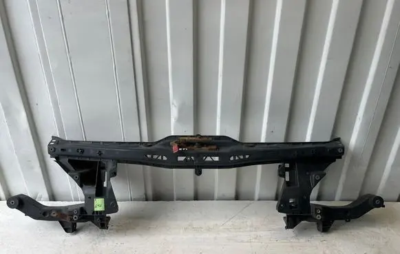 Radiator support slam panel