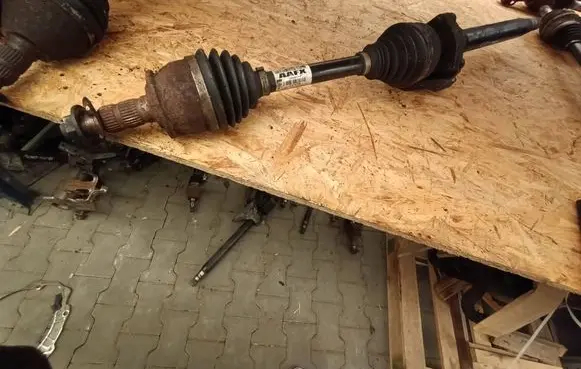 Opel Astra J Front driveshaft 13335143