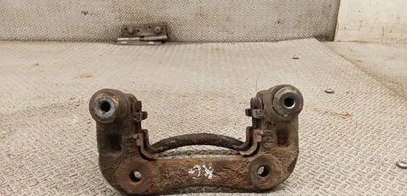 KIA Carens II Brake caliper pad carrier rear 