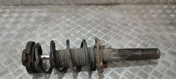 Volkswagen Golf VI Front shock absorber with coil spring 