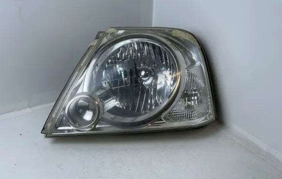 Suzuki Grand Vitara I Headlight/headlamp 10059041