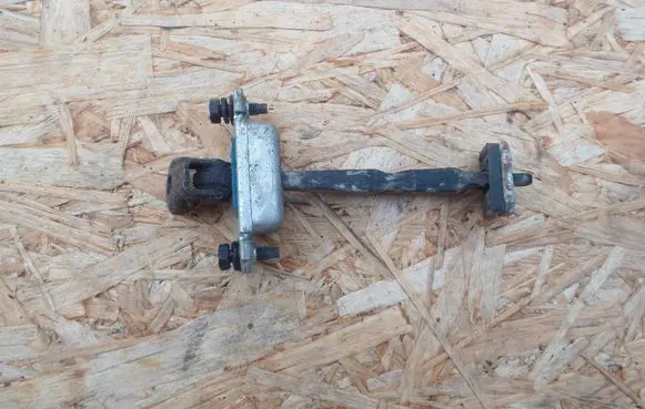 Rear door check strap stopper