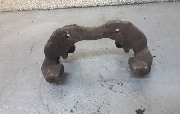 Ford Focus Front Brake Caliper Pad/Carrier 