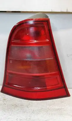 Tail light bulb cover holder