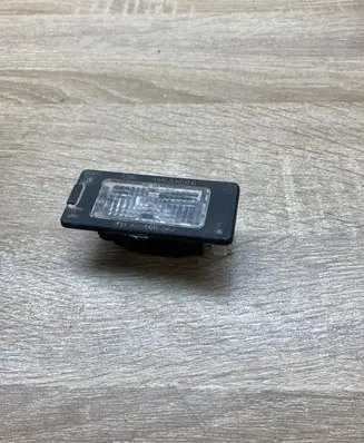 Volkswagen Tiguan Number plate light 5N0943021 1K9943127A