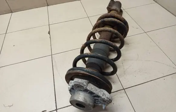 Front shock absorber with coil spring