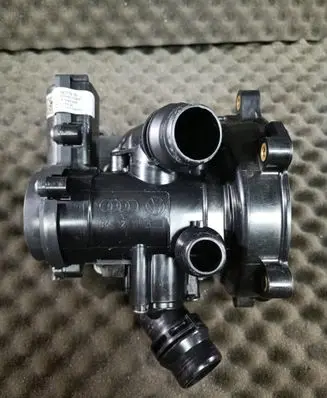 Audi A5 Thermostat housing 06L121111L