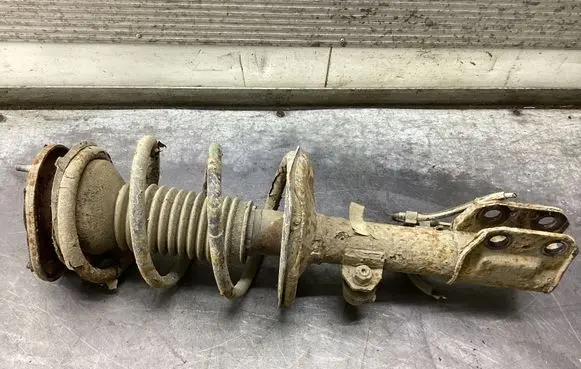 Toyota Corolla Verso AR10 Front shock absorber with coil spring