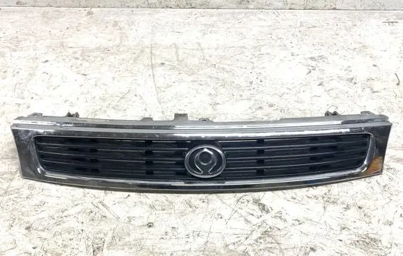 Mazda 626 Front bumper upper radiator grill G51650710