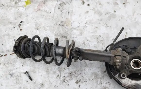 Volkswagen Touran I Front shock absorber with coil spring 
