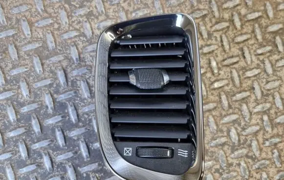 Dash center air vent grill