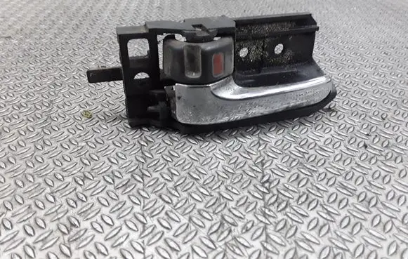 Toyota Avensis T250 Front door interior handle 50594A1