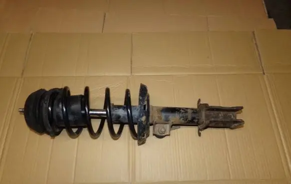 Opel Corsa C Front shock absorber with coil spring
