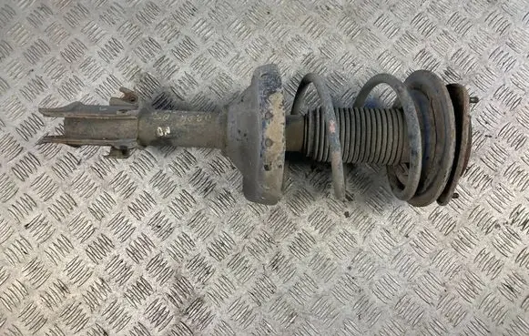 Subaru Legacy Front shock absorber with coil spring