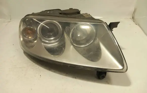 Volkswagen Touareg I Headlight/headlamp 7L6941016CE 89307881