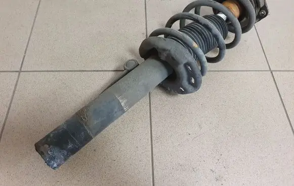Volkswagen PASSAT CC Front shock absorber with coil spring 3C0413031AJ