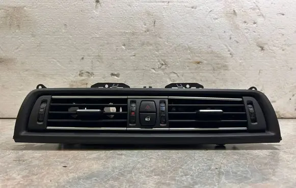 Dash center air vent grill
