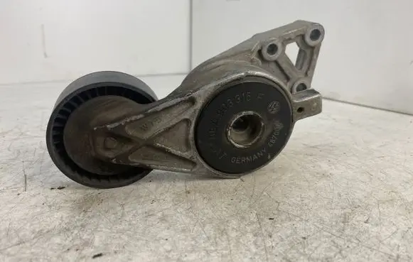 Volkswagen PASSAT B6 Alternator belt tensioner 06A903315F