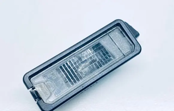 Volkswagen PASSAT B7 Number plate light 1K8943021