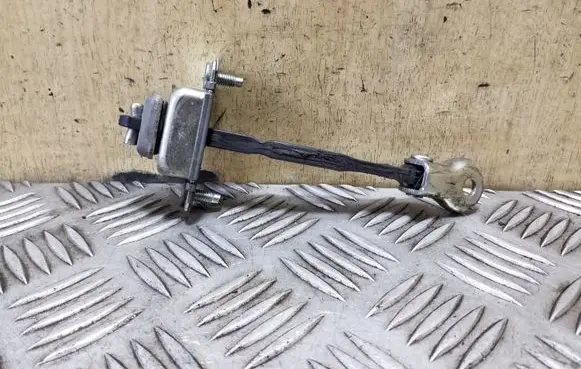 Subaru Outback Front door check strap stopper
