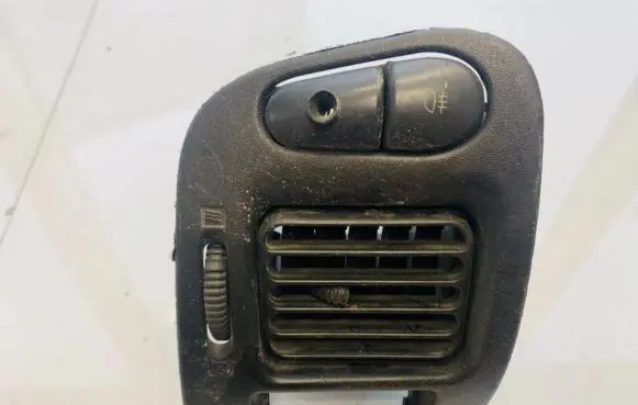 Mitsubishi Lancer Dash center air vent grill