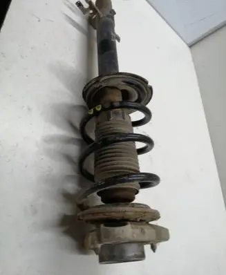 Front shock absorber with coil spring