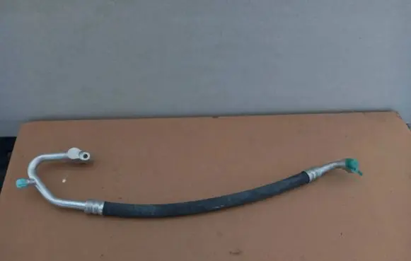 Hyundai Accent Air conditioning (A/C) pipe/hose 9776022200