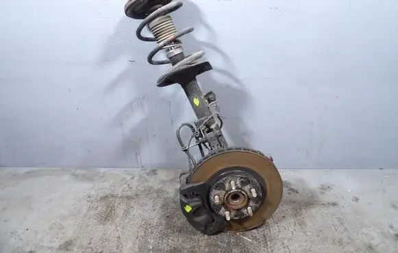Front shock absorber with coil spring