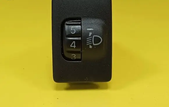 Headlight level height control switch
